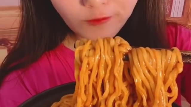 Eating fast noodle with egg