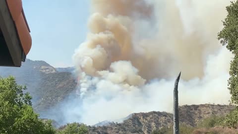 Smoke Engulfs Sky As Wildfire Spreads Rapidly With Onshore Winds in California