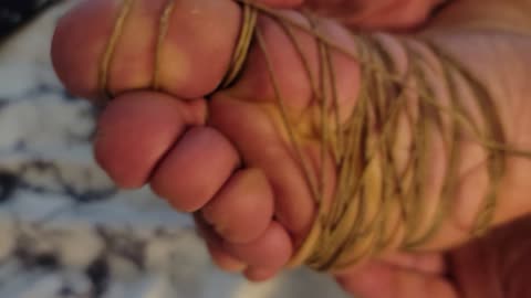 Tieing Up My Feet With Hemp Rope