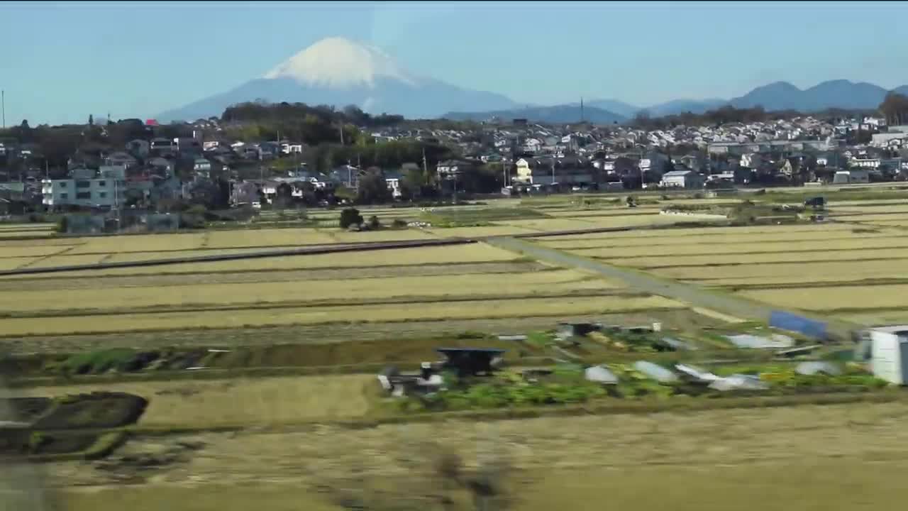 Bullet Train Crushing Through Mount Fuji at