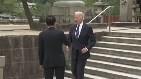 Biden BARELY Makes It Down The Stairs After Coming Close To Falling