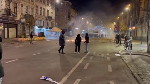 Moroccans clash with Belgian police in Brussels, Belgium.