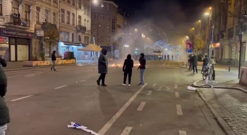 Moroccans clash with Belgian police in Brussels, Belgium.