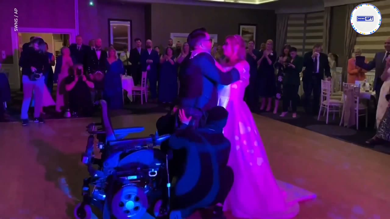 Couple's wedding turns emotional as groom stands for first time