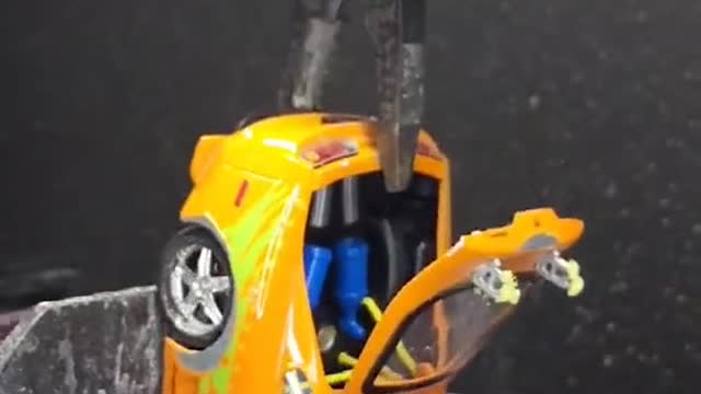 Put the car model on the grinder.