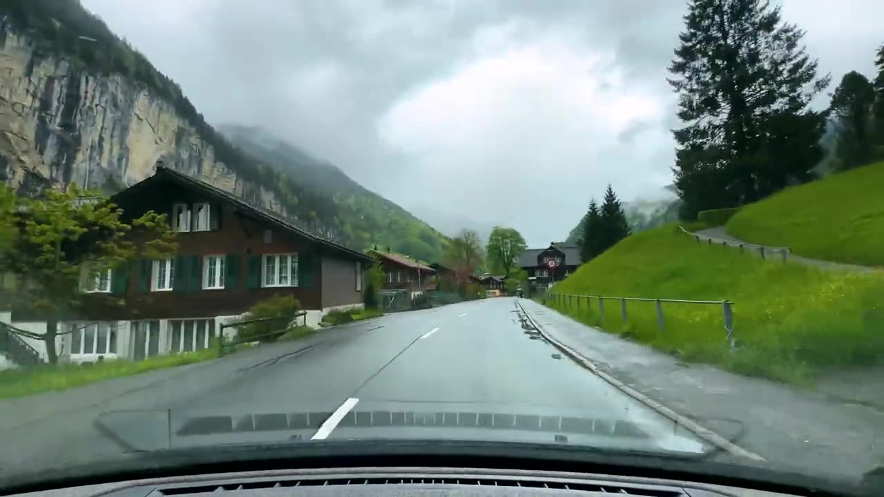 Driving in Lauterbrunnen Valley during fresh summer rain 🇨🇭 Switzerland 4K