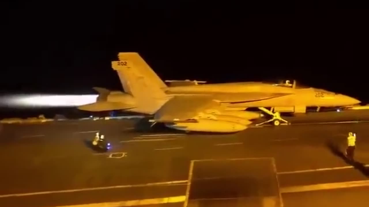 F-18 Taking Off Aircraft Carrier At Night