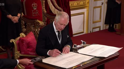 King Charles frustrated at the tiny table