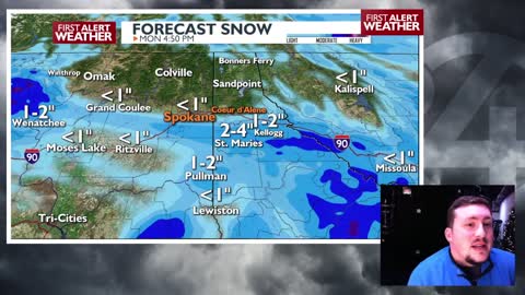 More snow showers tonight and a colder Monday