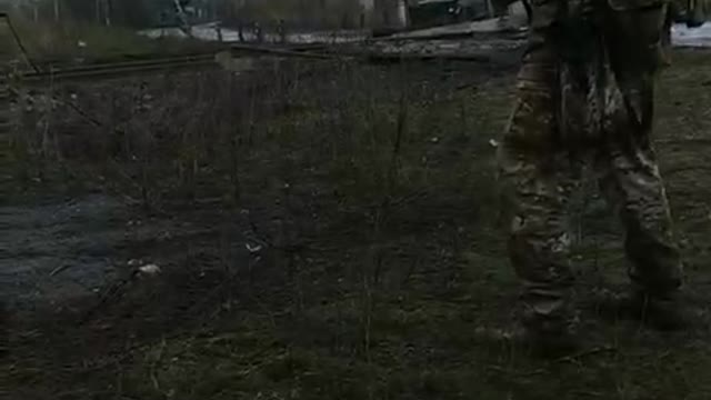 Ukrainian Soldier Firing Grenade at Russians