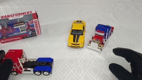 MINIATURAS TRANSFORMERS OPTIMUS PRIME 1/32 E MINIATURA BUMBLEBEE 1/32, CALIFORNIA ACTION, UNBOXING!