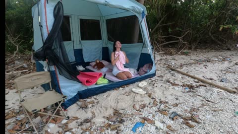 Young girl in solo overnight camping in rain part2