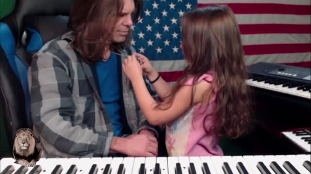 Bella Talking about Jesus while Playing Keyboards with Daddy