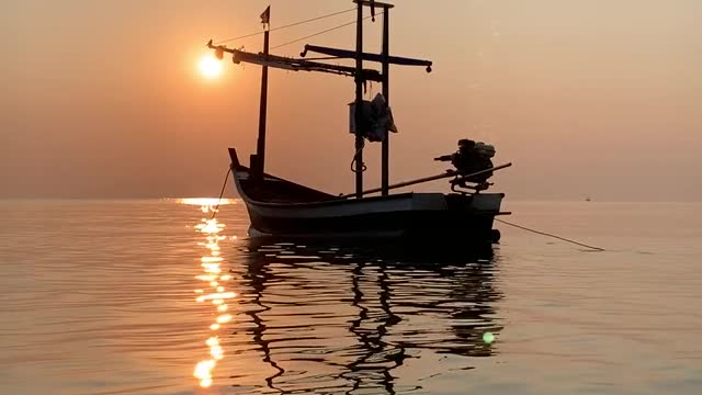 sun set with boat