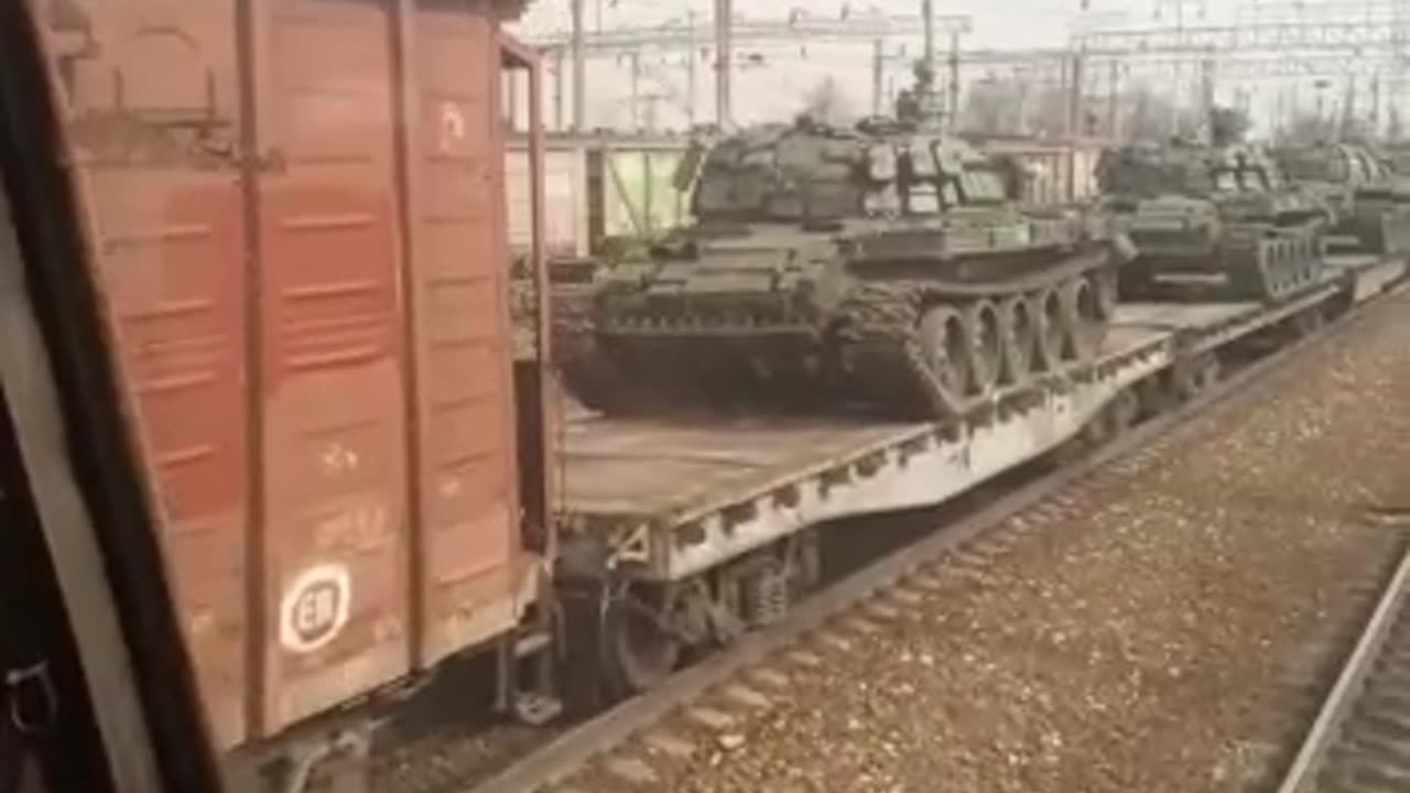 Modified Russian tanks seen heading west towards Ukraine