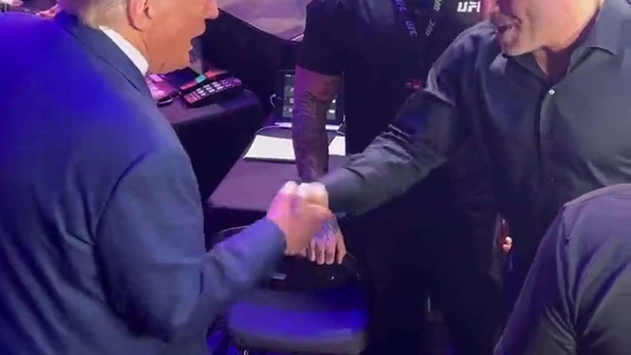 Joseph Martelli - Donald Trump shaking Joe Rogans hand jjm7777