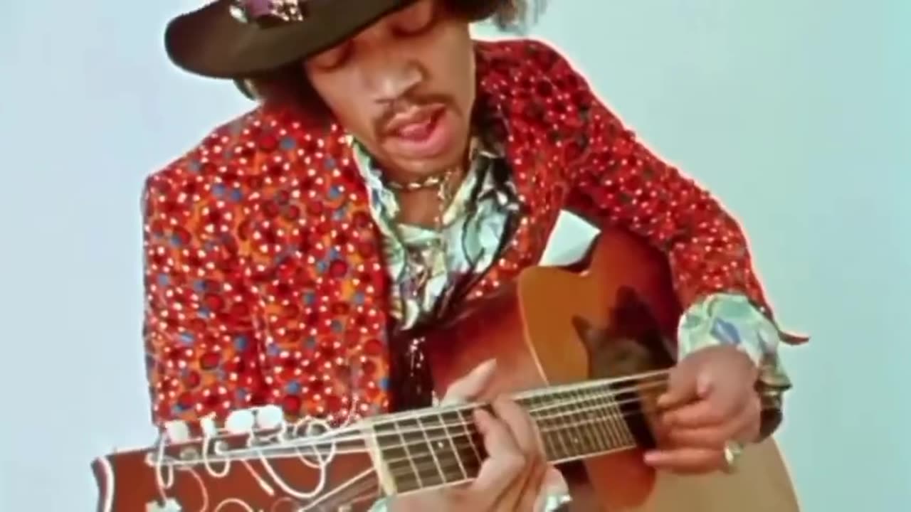 Jimmy Hendrix playing Aucustic and Singing