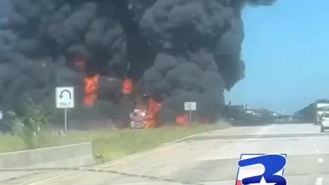 An oil tanker and at least one other vehicle are engulfed in flames on Highway