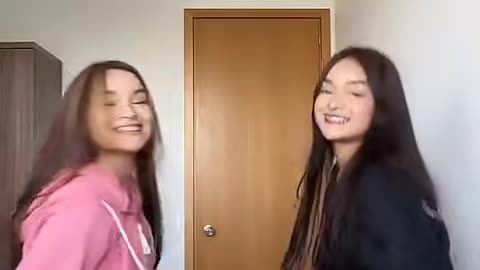 Cute dancing twins