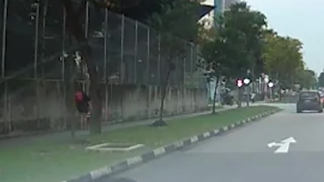 Man jumps in front of carin Serangoon