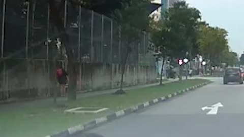 Man jumps in front of carin Serangoon