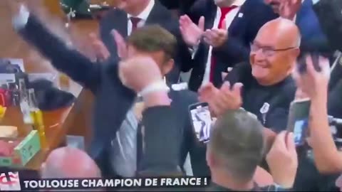 Macron gulped down a bottle of beer after Toulouse won the rugby championship