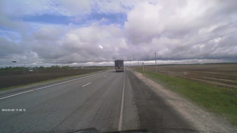 Speeding Truck Has Cargo Flying Out of the Top!