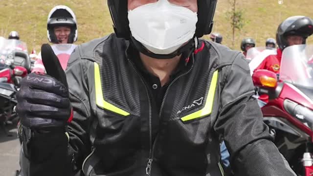 MENEWSDPM Lawrence Wong rides with motorcycle convoy