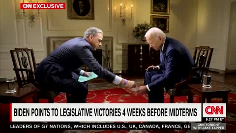 Biden drops his notes during an interview