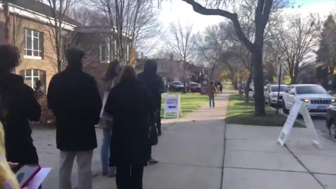 Shorewood polling place line trails down block at mid-afternoon election day check-in