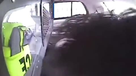 Police car flips over with prisoner inside