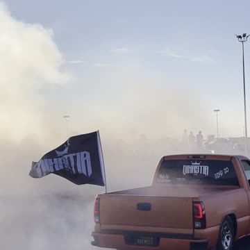 Orange Metallic GMC Sierra putting on a show at TRUCKIN' MADNESS! #shorts