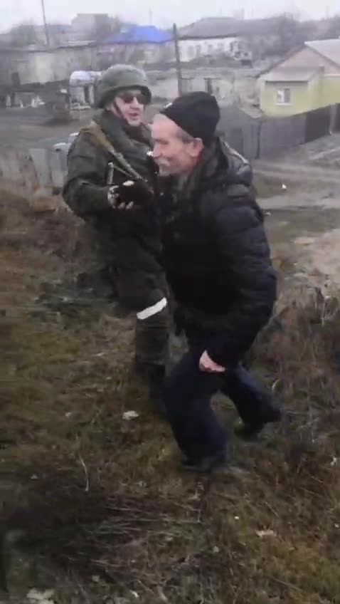 Local residents of Stanytsia Luganskaya greet the People's Militia of the LPR