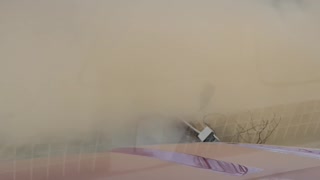 Dust Cloud Blocks the Road