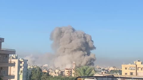 Smoke rising in the aftermath of fresh Israeli airstrikes on the southern suburbs of Beirut