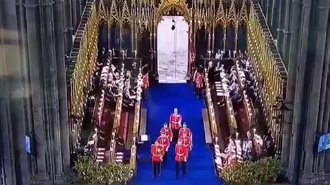 What is that, passing by, at King Charles' coronation?