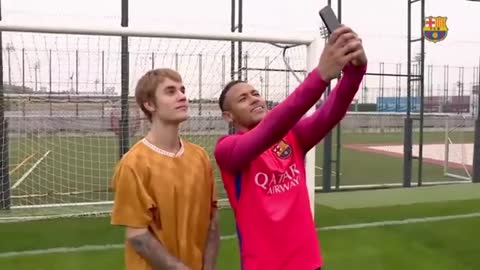 Justin Bieber and Neymar have a kick around at Barcelona training