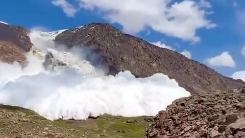 Tian Shan mountains in Kyrgyzstan, a group of tourists captured this impressive