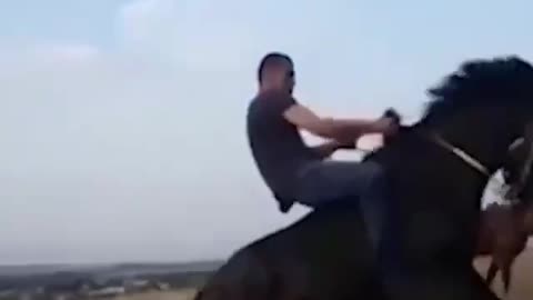 horse wants dude off his back.