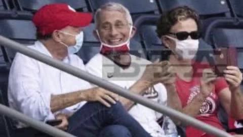 Dr fraud fauci at a baseball game July 2020 without a mask with no social distancing
