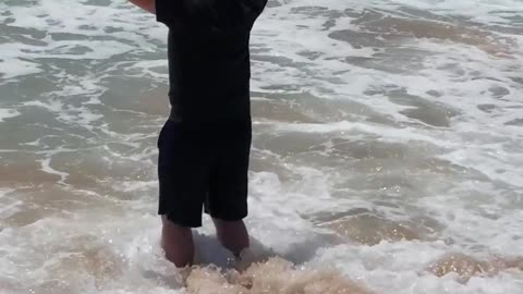 Brendan in Surf at Beach in Kauai