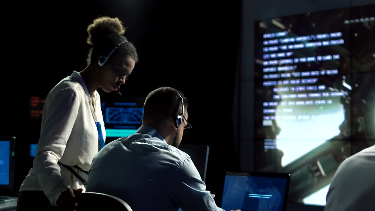 Scientist in flight control center
