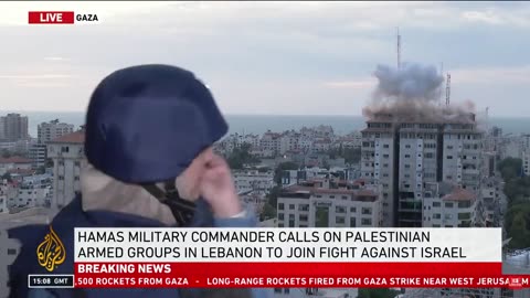 Journalist reports live from Gaza as neighbouring building hit by Israel airstrike