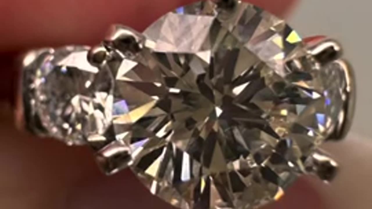 Setting a new head in a ring and freshening up prongs on a matching band