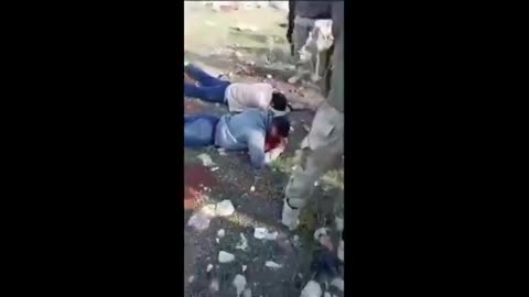 Documenting crimes_CIAISRAHELLTURK FAKErebel_ terrorists openly slaughter ex-SAA soldiers in streets