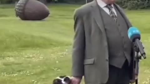 The President of Ireland with 'Misneach', his dog, making mischief during a speech 🤣