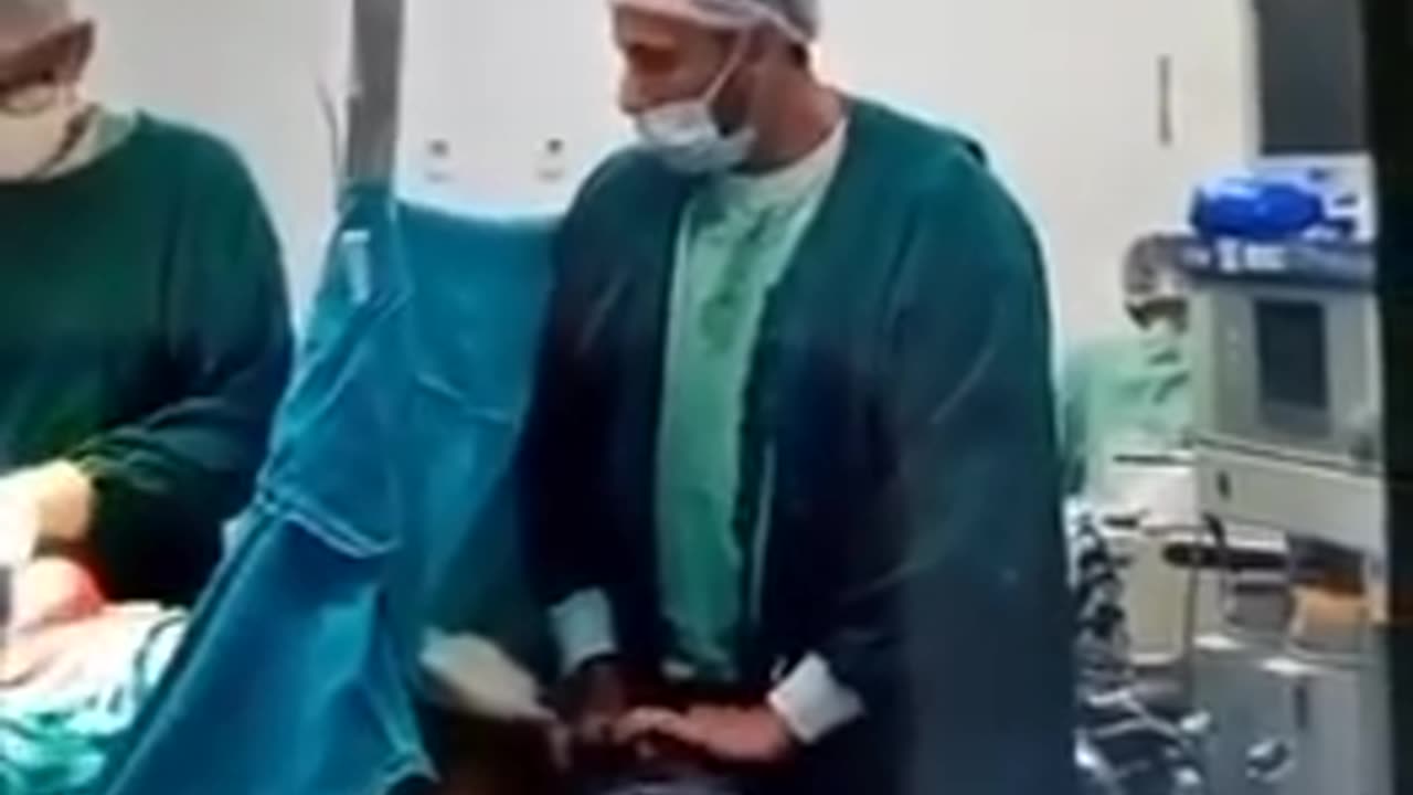 THESE ARE THE FREAK MEDICAL ESTABLISHMENT: FILTHY BASTARDS: This woman was having a C section.