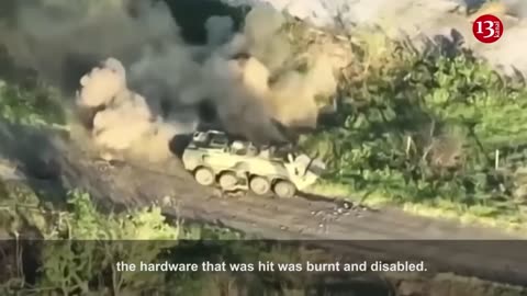 Drone footage shows Russian armored vehicles burning in Ukrainian countryside