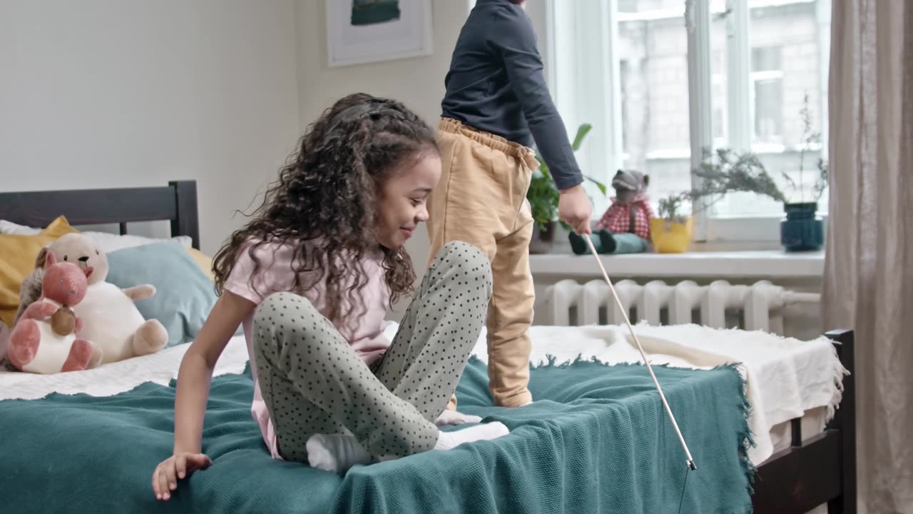 KIDS PLAYING WITH CAT