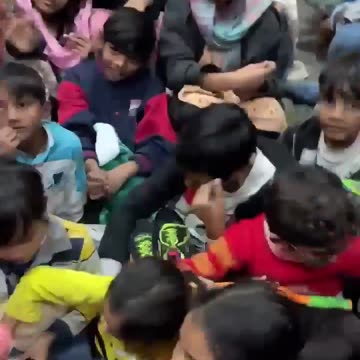 Pakistani orphans are excited to talk with Uncle Ray, Christmas gifts arrived.